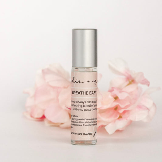 Indie + Mae | Aromatherapy Roller | 'Breathe Easy' with pink flowers in the background