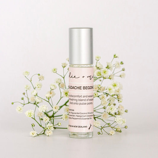 Indie + Mae | Aromatherapy Roller | with flowers on a light background