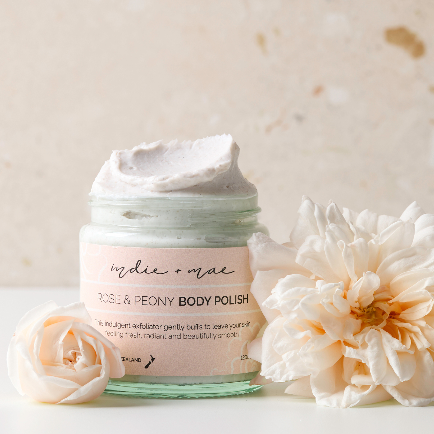 Indie + Mae Glow Cracker Gift Set with Warm Vanilla Body Butter and Rose & Peony Body Polish, styled product photo