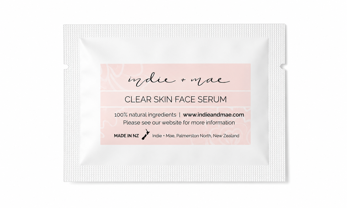 Clear skin face serum packaging with 'Indie + Mae' branding on a white background