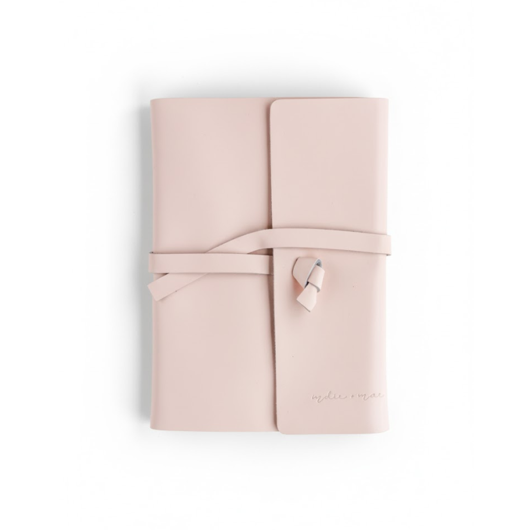 Pink journal with a strap on a white background  | Indie + Mae | Gifts Under $50