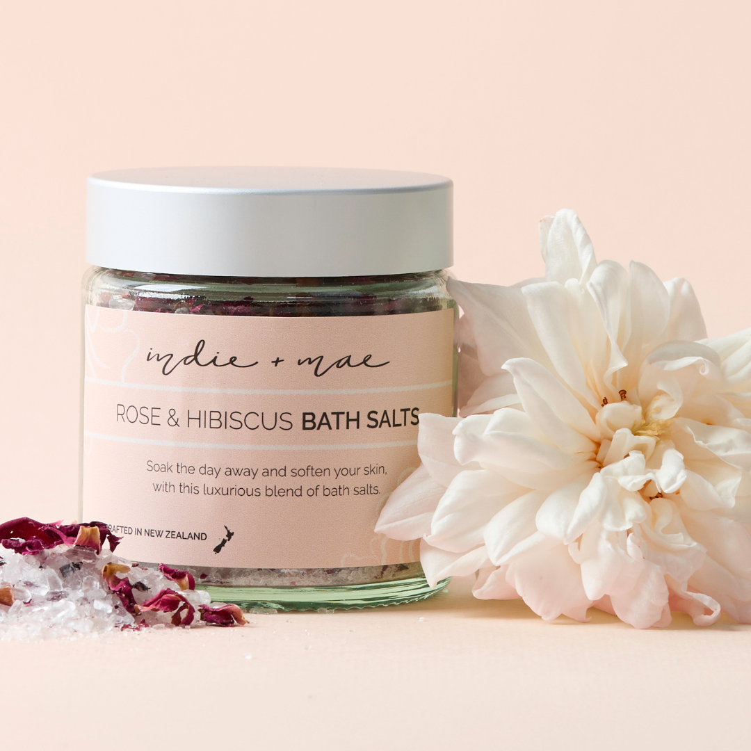 Indie + Mae Unwind Cracker Gift Set with Rose & Hibiscus Bath Salts, Dreamer Candle and muslin bag, styled product photo