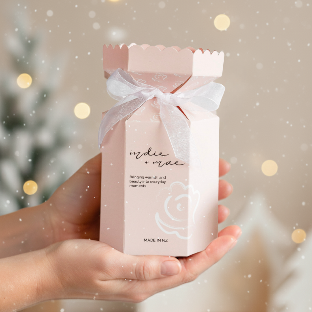 Hands holding a Christmas Cracker Gift Set