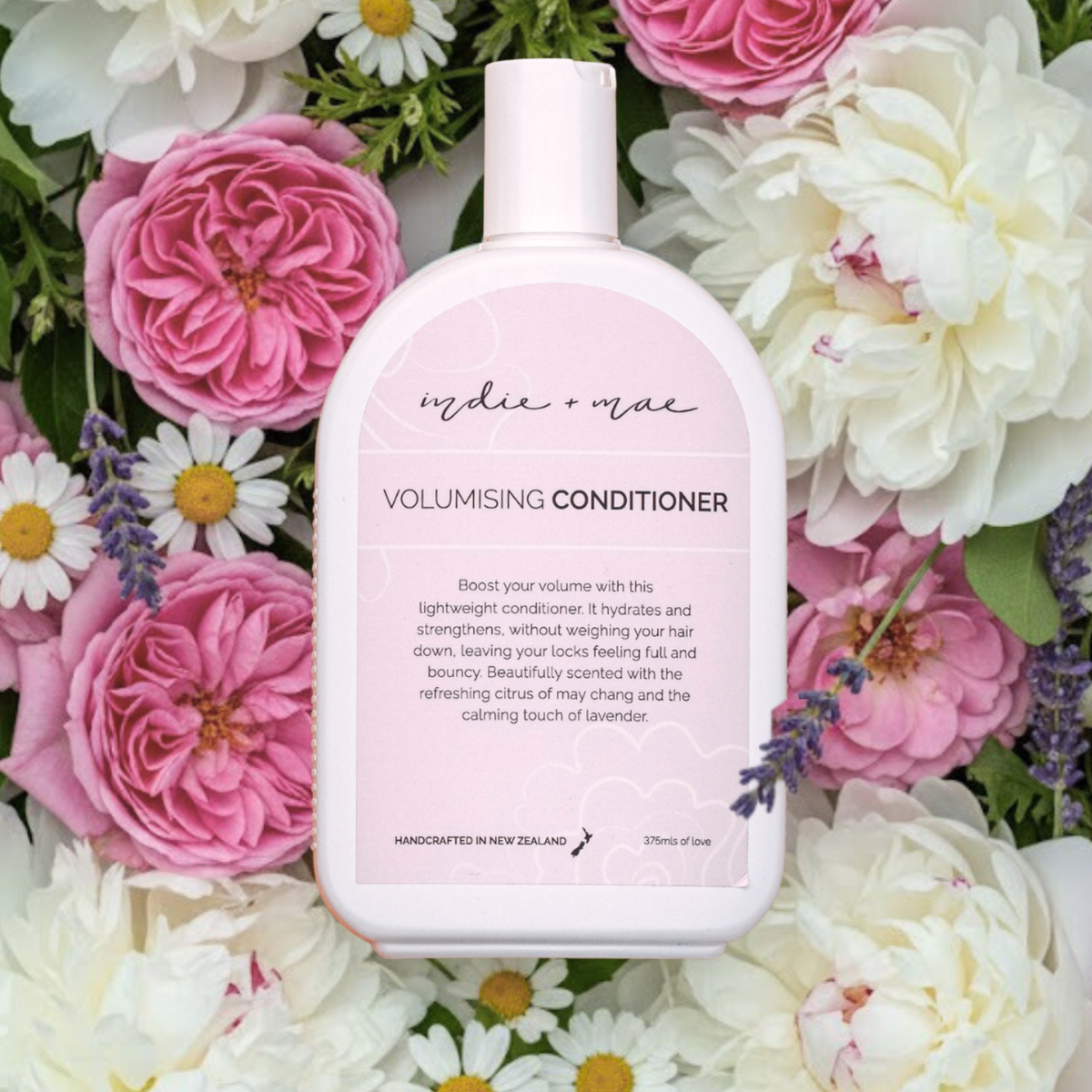 Indie + Mae Volumising Conditioner bottle, styled product photo