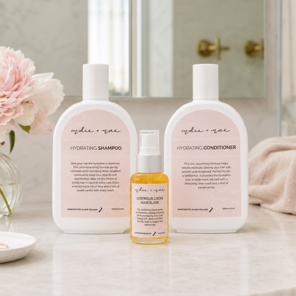Indie + Mae Hydrating Trio with shampoo, conditioner and Lustrous Locks Hair Elixir, alternative product view