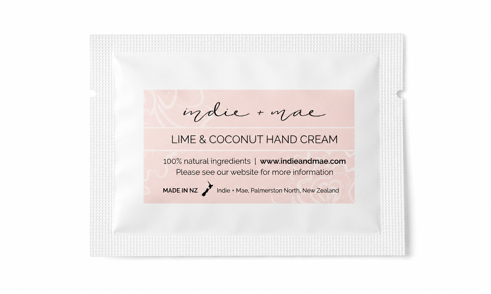 Indie + Mae lime & coconut hand cream sample packet on a white background