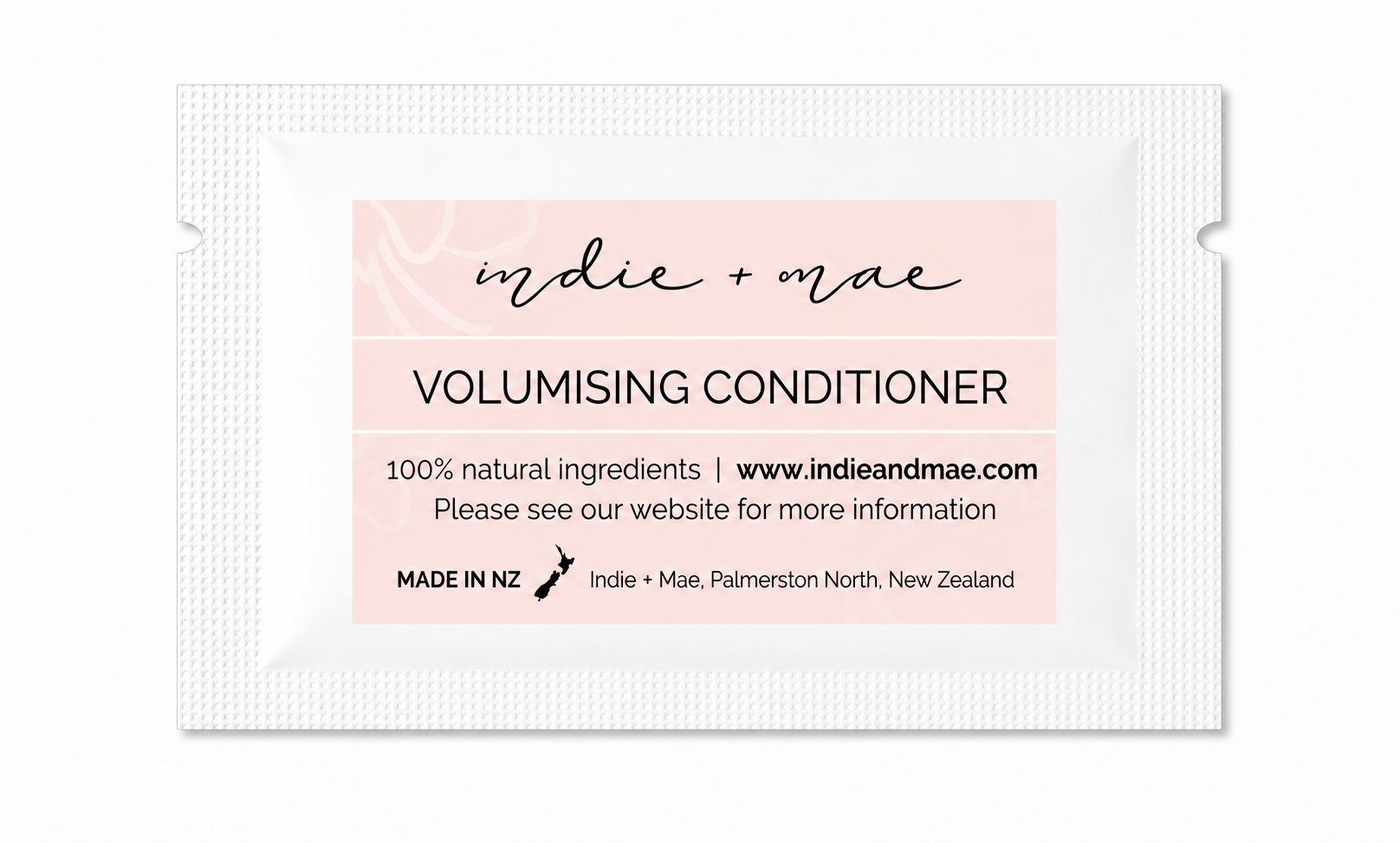 Indie + Mae volumising conditioner packet with pink label on white background
