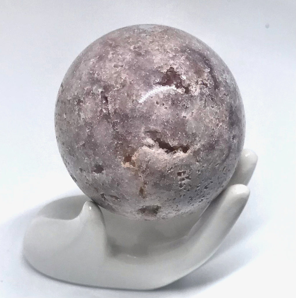 Baby Pink Amethyst Sphere with ceramic hand